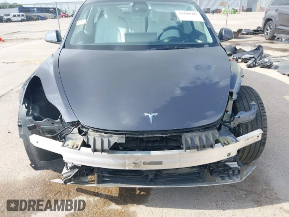 2023 Tesla Model 3 with VIN 5YJ3E1EA7PF567906, listed as a IAAI auction lot 42280993 with 41,452 mi miles and . Bid and sale history available at DreamBid. Image 13.