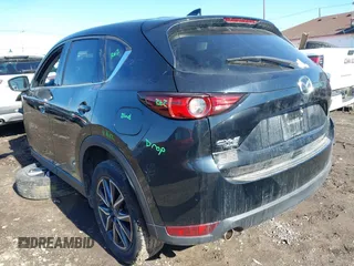 2018 Mazda CX-5 Grand Touring with VIN JM3KFBDM5J0441518, listed as a IAAI auction lot 41748941 with 64,639 mi miles. Bid and sale history available at carsss.com. Image 3.
