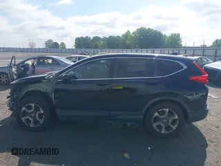 2018 Honda CR-V EX with VIN 7FARW1H59JE001943, listed as a IAAI auction lot 42123180 with 72,451 mi miles and . Bid and sale history available at carsss.com. Image 15.