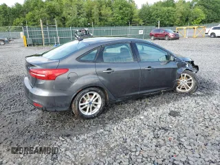 2016 Ford Focus SE z VIN 1FADP3F24GL313333, wystawiony jako Copart lot #60023715 z przebiegiem Nie podano mil oraz Szkoda całkowita • Salvage title. Historia ofert i sprzedaży dostępna na DreamBid. Obrazek 3.