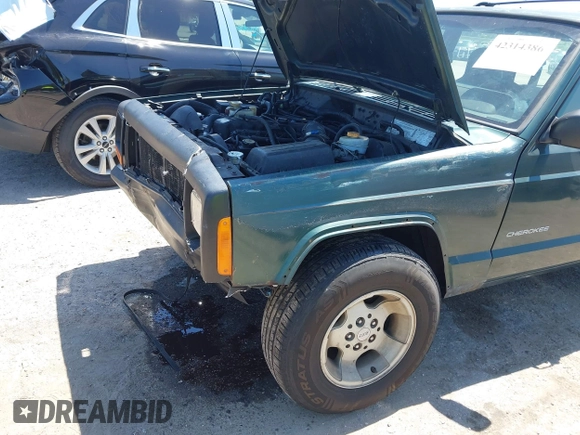2000 Jeep Cherokee SE with VIN 1J4FF28S0YL236369, listed as a IAAI auction lot 42314386 with 159,005 mi miles and . Bid and sale history available at DreamBid. Image 6.