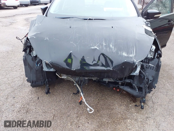 2014 Ford Focus Titanium with VIN 1FADP3J25EL310199, listed as a IAAI auction lot 40682901 with 84,885 mi miles and . Bid and sale history available at DreamBid. Image 6.