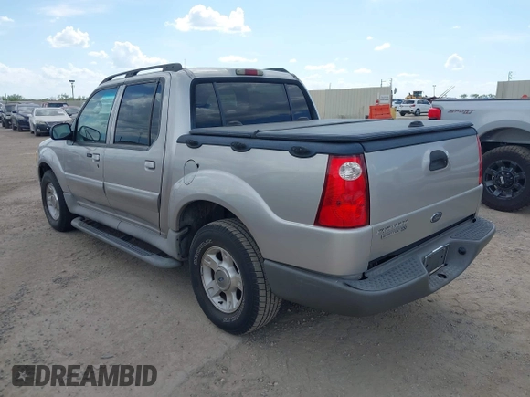 2003 Ford Explorer Sport Trac XLS z VIN 1FMZU67E43UA72537, wystawiony jako IAAI lot #42575959 z przebiegiem 142 692 mil mil oraz . Historia ofert i sprzedaży dostępna na DreamBid. Obrazek 3.