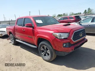 2018 Toyota Tacoma SR5 with VIN 5TFAZ5CN0JX063350, listed as a IAAI auction lot 41829396 with 61,155 mi miles and . Bid and sale history available at DreamBid. Image 1.