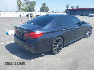 2017 BMW 5 Series 540i with VIN WBAJE5C38HG917101, listed as a IAAI auction lot 42047417 with 96,958 mi miles and . Bid and sale history available at DreamBid. Image 4.