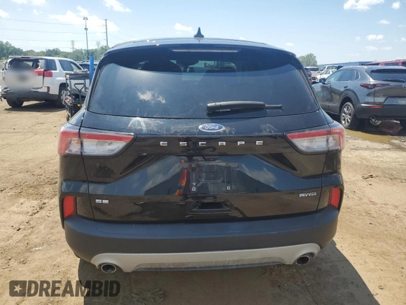 2022 Ford Escape SE z VIN 1FMCU9G67NUB69346, wystawiony jako Copart lot #63013015 z przebiegiem Nie podano mil oraz Czysty tytuł • Clean title. Historia ofert i sprzedaży dostępna na DreamBid. Obrazek 6.