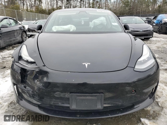 2020 Tesla Model 3 Standard Range Plus with VIN 5YJ3E1EAXLF661031, listed as a Copart auction lot 87912605 with Not Provided miles and Salvage Title. Bid and sale history available at DreamBid. Image 5.