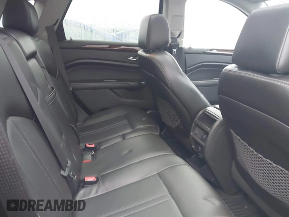 2014 Cadillac SRX Luxury Collection z VIN 3GYFNEE32ES643679, wystawiony jako IAAI lot #42172274 z przebiegiem 122 276 mil mil oraz . Historia ofert i sprzedaży dostępna na DreamBid. Obrazek 8.