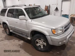 1999 Toyota 4Runner Limited z VIN JT3HN87R3X0214454, wystawiony jako IAAI lot #41921977 z przebiegiem 210 214 mil mil oraz . Historia ofert i sprzedaży dostępna na DreamBid. Obrazek 1.