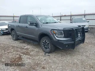 2021 Nissan Titan Pro-4X with VIN 1N6AA1ED3MN531332, listed as a IAAI auction lot 41918065 with 125,323 mi miles and . Bid and sale history available at DreamBid. Image 1.