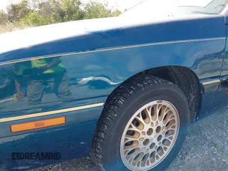 1995 Chrysler LeBaron z VIN 1C3EU4531SF679446, wystawiony jako IAAI lot #41441543 z przebiegiem 105 525 mil mil oraz . Historia ofert i sprzedaży dostępna na DreamBid. Obrazek 14.