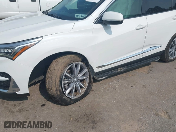 2021 Acura RDX Technology with VIN 5J8TC1H58ML009948, listed as a IAAI auction lot 42402678 with 113,463 mi miles and . Bid and sale history available at DreamBid. Image 6.
