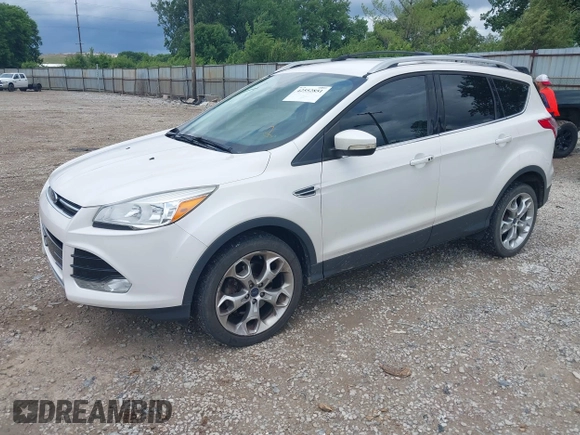 2016 Ford Escape Titanium z VIN 1FMCU9J90GUC76504, wystawiony jako IAAI lot #42552851 z przebiegiem 89 570 mil mil oraz . Historia ofert i sprzedaży dostępna na DreamBid. Obrazek 18.
