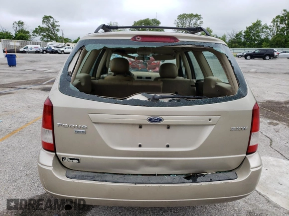 2006 Ford Focus SE with VIN 1FAFP36N66W149227, listed as a Copart auction lot 56008385 with 226,599 mi miles and Salvage title. Bid and sale history available at DreamBid. Image 6.