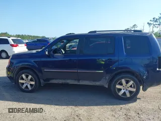 2014 Honda Pilot Touring with VIN 5FNYF4H92EB019248, listed as a IAAI auction lot 41942963 with 136,183 mi miles and . Bid and sale history available at carsss.com. Image 14.