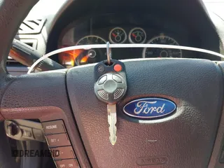 2007 Ford Fusion SE with VIN 3FAHP07157R142485, listed as a IAAI auction lot 42050207 with 150,263 mi miles. Bid and sale history available at carsss.com. Image 11.