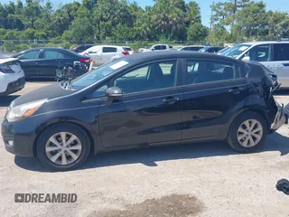 2013 Kia Rio EX with VIN KNADN4A32D6119638, listed as a IAAI auction lot 42313287 with 133,459 mi miles and . Bid and sale history available at DreamBid. Image 14.