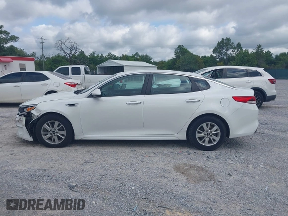2017 Kia Optima LX z VIN 5XXGT4L32HG161091, wystawiony jako IAAI lot #42266149 z przebiegiem 166 254 mil mil oraz . Historia ofert i sprzedaży dostępna na DreamBid. Obrazek 14.