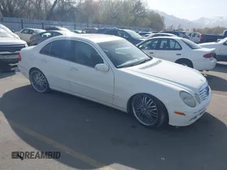 2003 Mercedes-Benz E-Class 3.2L with VIN WDBUF65J63A233107, listed as a IAAI auction lot 42004763 with 151,327 mi miles. Bid and sale history available at carsss.com. Image 1.