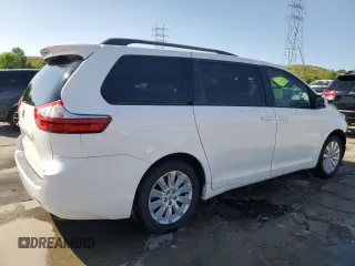 2015 Toyota Sienna LE with VIN 5TDJK3DC2FS126466, listed as a Copart auction lot 61165105 with 56,634 mi miles and Salvage title. Bid and sale history available at DreamBid. Image 3.