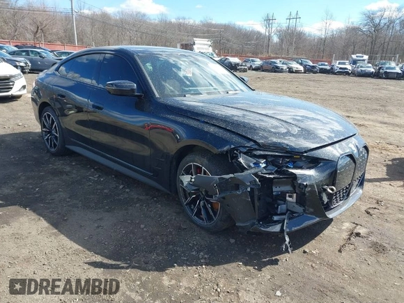 2024 BMW i4 xDrive40 z VIN WBY83FB04RFT19615, wystawiony jako IAAI lot #41679918 z przebiegiem 3 883 mil mil oraz . Historia ofert i sprzedaży dostępna na DreamBid. Obrazek 1.