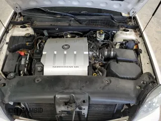 2004 Cadillac DeVille DHS z VIN 1G6KE54Y14U248539, wystawiony jako Copart lot #51995685 z przebiegiem 149 571 mil mil oraz Czysty tytuł • Clean title. Historia ofert i sprzedaży dostępna na DreamBid. Obrazek 11.