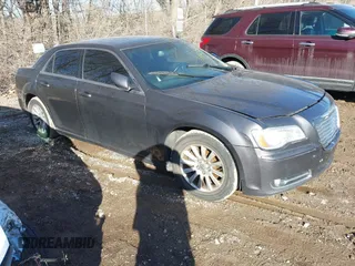 2013 Chrysler 300 with VIN 2C3CCAAG0DH574691, listed as a IAAI auction lot 41914063 with 232,318 mi miles. Bid and sale history available at carsss.com. Image 1.
