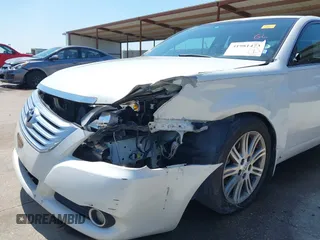 2008 Toyota Avalon XL with VIN 4T1BK36B88U306912, listed as a IAAI auction lot 41981473 with 148,461 mi miles. Bid and sale history available at carsss.com. Image 6.
