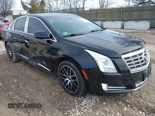 2015 Cadillac XTS Luxury z VIN 2G61N5S35F9155543, wystawiony jako IAAI lot #41699914 z przebiegiem 120 700 mil mil oraz . Historia ofert i sprzedaży dostępna na DreamBid. Obrazek 1.
