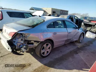 2014 Volkswagen CC Sport z VIN WVWBP7AN2EE505913, wystawiony jako Copart lot #42380915 z przebiegiem 98 976 mil mil oraz Szkoda całkowita • Salvage title. Historia ofert i sprzedaży dostępna na DreamBid. Obrazek 3.