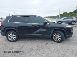 2016 Jeep Cherokee Limited z VIN 1C4PJMDB7GW316548, wystawiony jako IAAI lot #41271877 z przebiegiem 157 293 mil mil oraz . Historia ofert i sprzedaży dostępna na DreamBid. Obrazek 13.