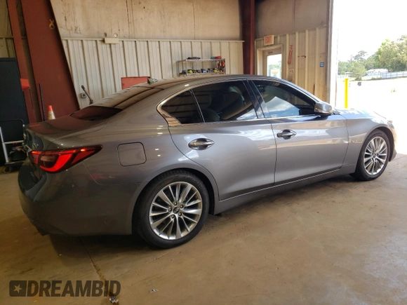 2018 Infiniti Q50 Luxe с VIN JN1EV7AP5JM363497, выставлен на аукционе Copart как лот 56227435 с пробегом 108 830 миль миль и Списание • Salvage title. История ставок и продаж доступна на DreamBid. Изображение 3.