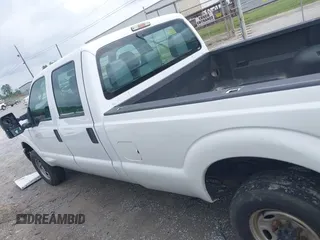 2015 Ford F-250 Lariat with VIN 1FT7W2B6XFEC33499, listed as a IAAI auction lot 42114064 with 215,314 mi miles and . Bid and sale history available at carsss.com. Image 14.