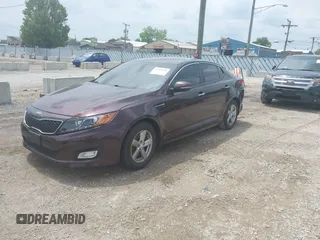 2014 Kia Optima LX z VIN 5XXGM4A7XEG305629, wystawiony jako IAAI lot #42370105 z przebiegiem 240 254 mil mil oraz . Historia ofert i sprzedaży dostępna na DreamBid. Obrazek 2.