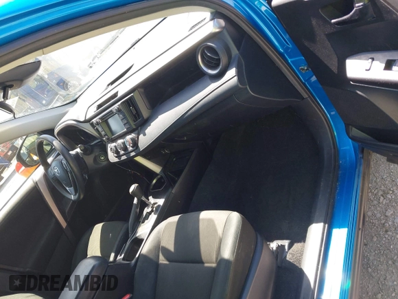 2018 Toyota RAV4 LE with VIN JTMZFREV4JJ734702, listed as a IAAI auction lot 41987540 with 141,526 mi miles. Bid and sale history available at carsss.com. Image 5.