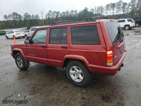 1999 Jeep Cherokee Sport with VIN 1J4FT68S1XL601799, listed as a Copart auction lot 83881844 with 203,572 mi miles and Salvage Title. Bid and sale history available at carsss.com. Image 2.