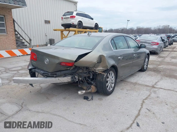 2011 Buick Lucerne CXL Premium with VIN 1G4HJ5EM0BU104715, listed as a IAAI auction lot 41706751 with 123,636 mi miles. Bid and sale history available at carsss.com. Image 4.