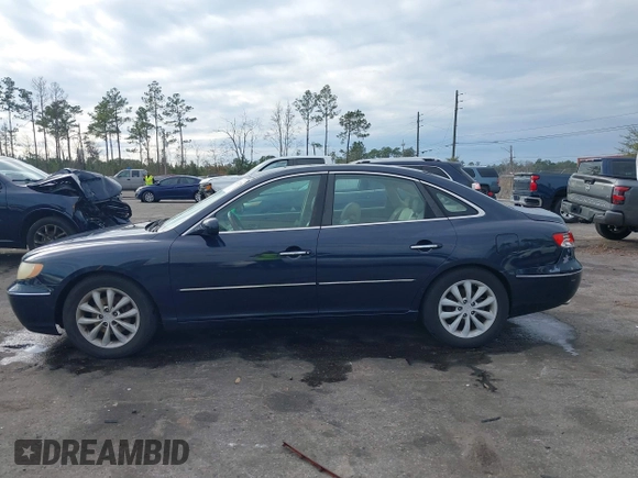 2006 Hyundai Azera SE with VIN KMHFC46F86A110023, listed as a IAAI auction lot 41427898 with 197,837 mi miles and . Bid and sale history available at DreamBid. Image 14.