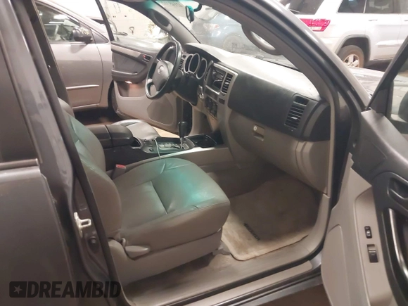 2003 Toyota 4Runner SR5 with VIN JTEBU14R630018160, listed as a IAAI auction lot 42145312 with 296,865 mi miles and . Bid and sale history available at DreamBid. Image 5.