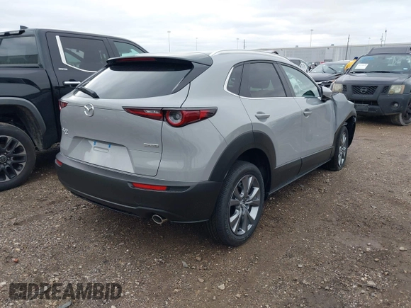 2025 Mazda CX-30 S Preferred with VIN 3MVDMBCM7SM771411, listed as a IAAI auction lot 41290560 with 4 mi miles and . Bid and sale history available at DreamBid. Image 4.