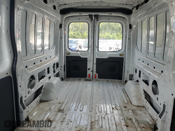 2016 Ford Transit Cargo with VIN 1FTYR2CM1GKB43234, listed as a Copart auction lot 65311135 with 59,502 mi miles and Salvage title. Bid and sale history available at DreamBid. Image 10.