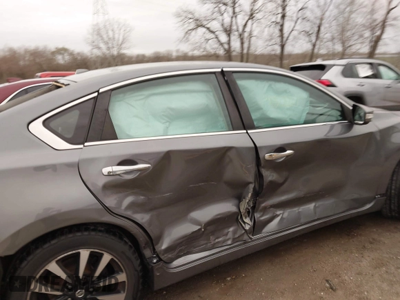 2018 Nissan Altima SR with VIN 1N4AL3AP1JC244271, listed as a IAAI auction lot 41828261 with 134,258 mi miles and . Bid and sale history available at carsss.com. Image 14.