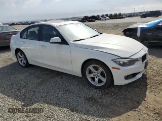 2015 BMW 3 Series 328i with VIN WBA3C1C51FP852825, listed as a Copart auction lot 53169305 with 184,383 mi miles and Salvage title. Bid and sale history available at DreamBid. Image 4.
