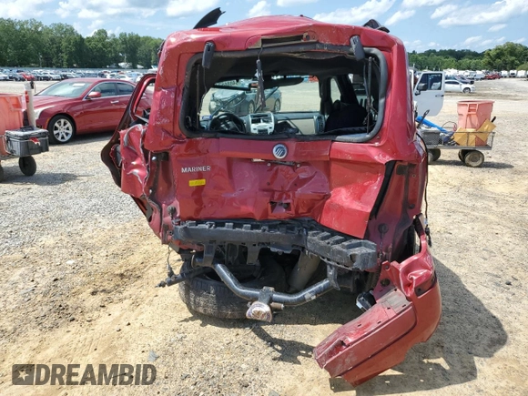 2011 Mercury Mariner z VIN 4M2CN8B76BKJ03934, wystawiony jako Copart lot #64886574 z przebiegiem Nie podano mil oraz Szkoda całkowita • Salvage title. Historia ofert i sprzedaży dostępna na DreamBid. Obrazek 6.