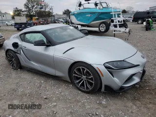 2022 Toyota GR Supra 2.0 with VIN WZ1DB2C09NW048380, listed as a Copart auction lot 87413024 with 0 mi miles and Salvage Title. Bid and sale history available at carsss.com. Image 4.