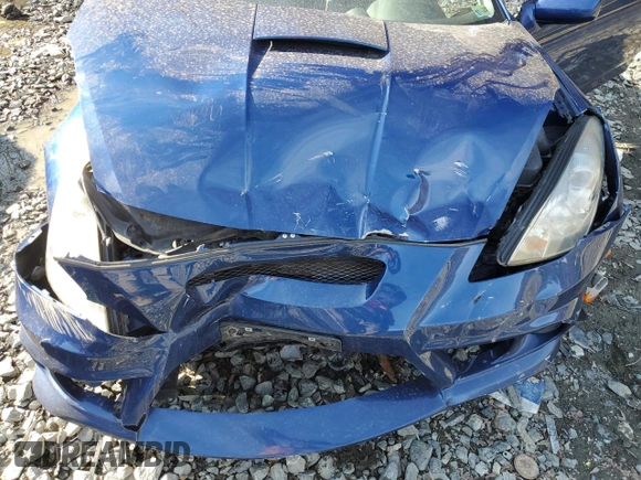2003 Toyota Celica GT z VIN JTDDR32T530167152, wystawiony jako Copart lot #47235825 z przebiegiem 141 513 mil mil oraz Szkoda całkowita • Salvage title. Historia ofert i sprzedaży dostępna na DreamBid. Obrazek 12.