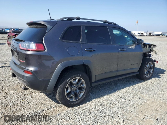 2019 Jeep Cherokee Trailhawk Elite z VIN 1C4PJMBN0KD427007, wystawiony jako Copart lot #57429735 z przebiegiem 54 070 mil mil oraz Szkoda całkowita • Salvage title. Historia ofert i sprzedaży dostępna na DreamBid. Obrazek 3.
