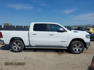 2023 Ram 1500 Laramie with VIN 1C6SRFJT0PN508550, listed as a IAAI auction lot 41913849 with 57,765 mi miles and . Bid and sale history available at DreamBid. Image 13.