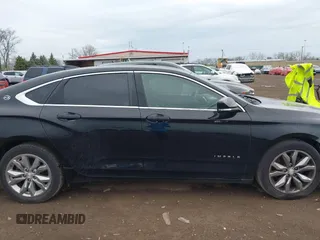 2017 Chevrolet Impala LT with VIN 1G1105S3XHU158948, listed as a IAAI auction lot 42036010 with 121,996 mi miles and . Bid and sale history available at DreamBid. Image 13.