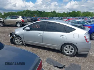 2007 Toyota Prius z VIN JTDKB20U677677900, wystawiony jako IAAI lot #42176780 z przebiegiem 246 442 mil mil oraz . Historia ofert i sprzedaży dostępna na DreamBid. Obrazek 14.